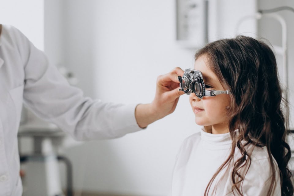 Little Girl Checking Up Her Sight Ophthalmology Center
