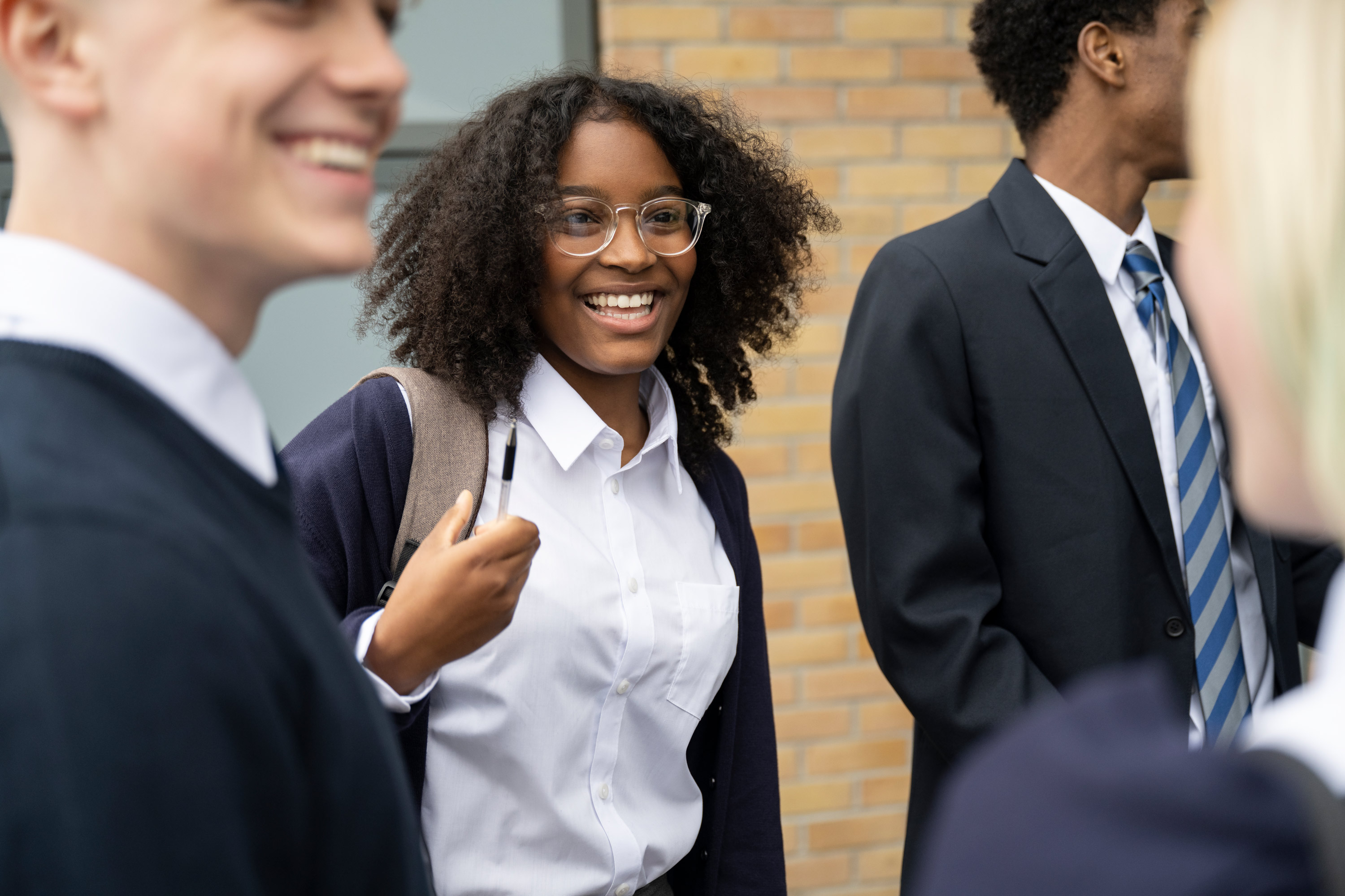 Smiling School Student Amongst Classmates